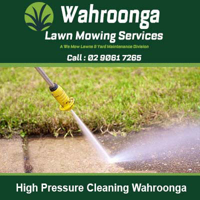 Yellow pressure washing nozzle cleaning pathway in Wahroonga